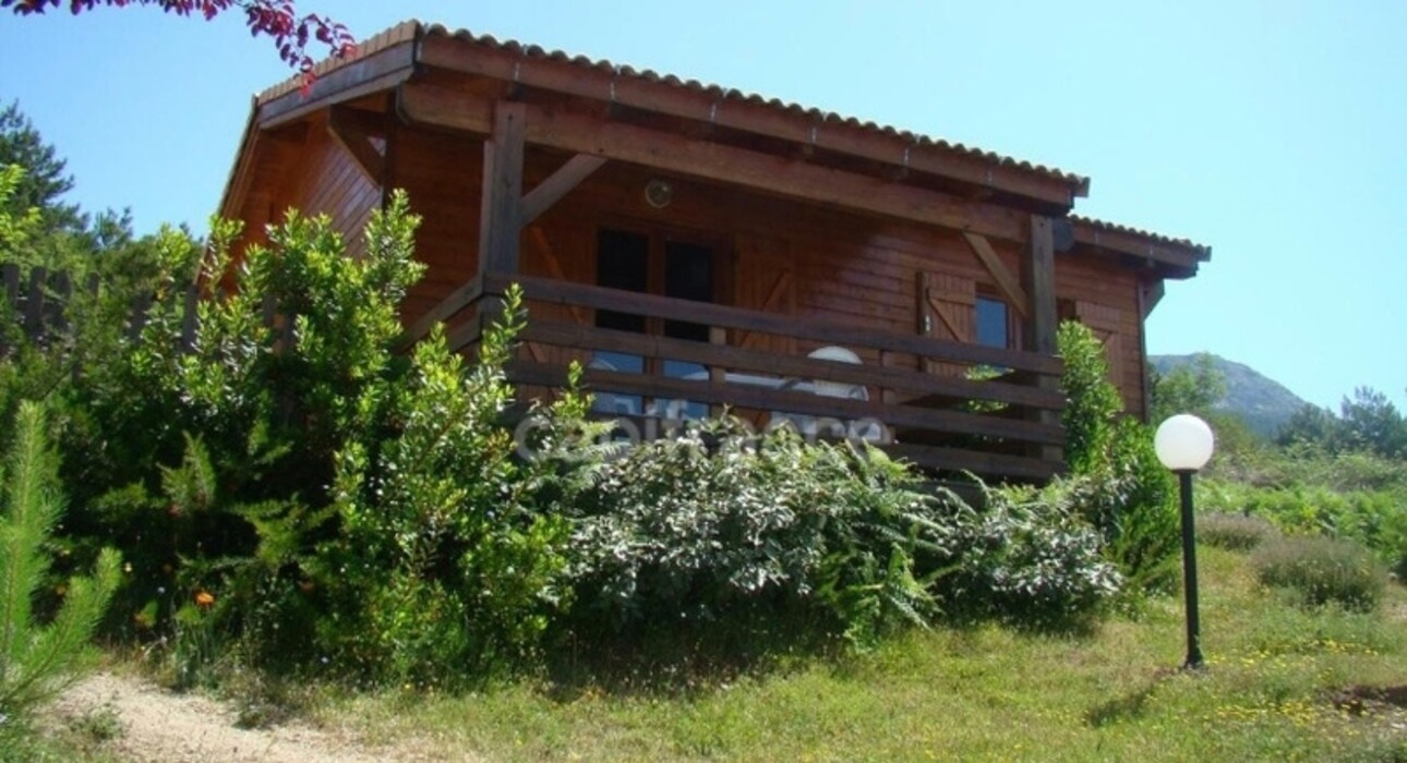 Photos 4 - Touristique - Dpt Corse (20), à vendre EVISA, ensemble de six chalets en bois avec terrasse, sur terrain avec piscine et parking