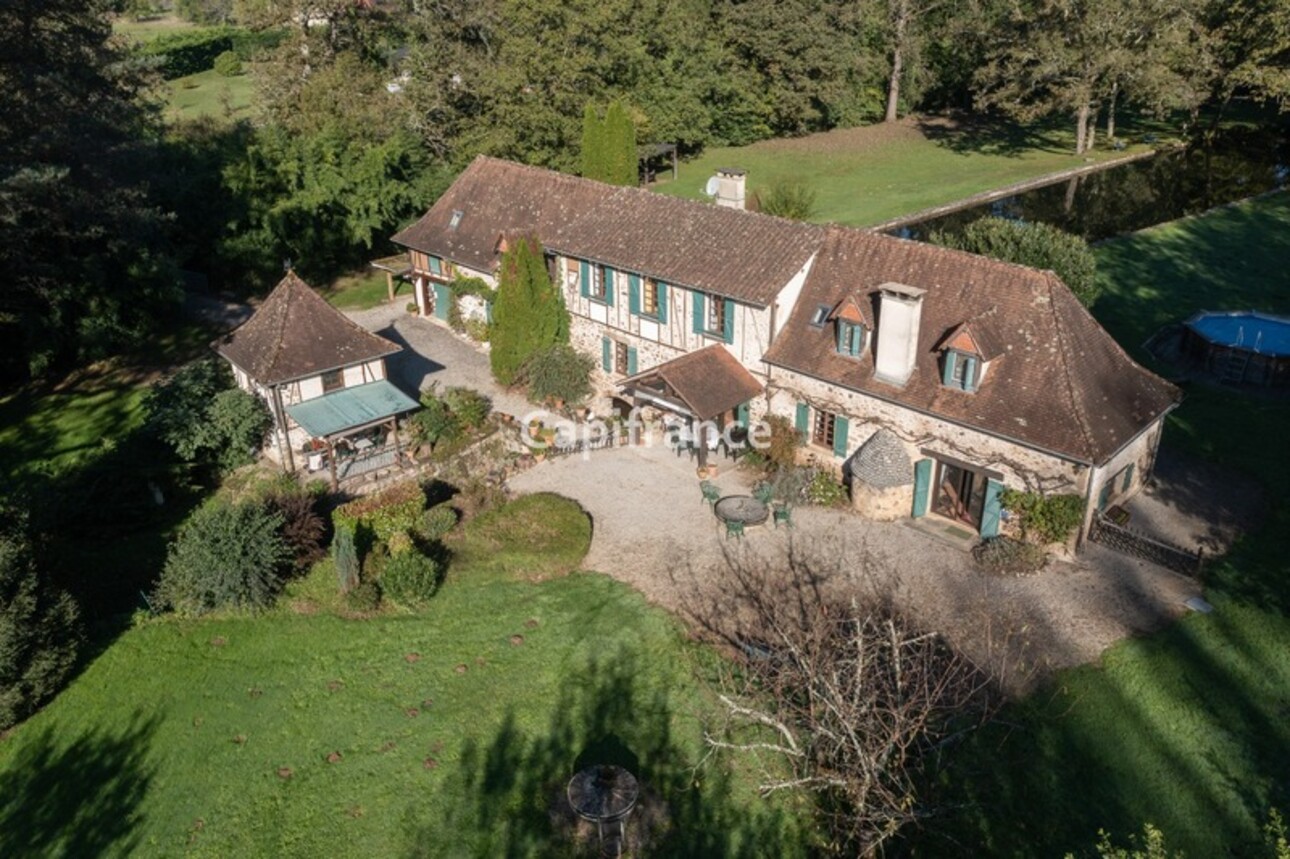 Photos 1 - Tourist - Dpt Corrèze (19), à vendre proche de BEAULIEU SUR DORDOGNE ancien moulin restauré P12 de 280 m² - Terrain de 9 025,00 m²