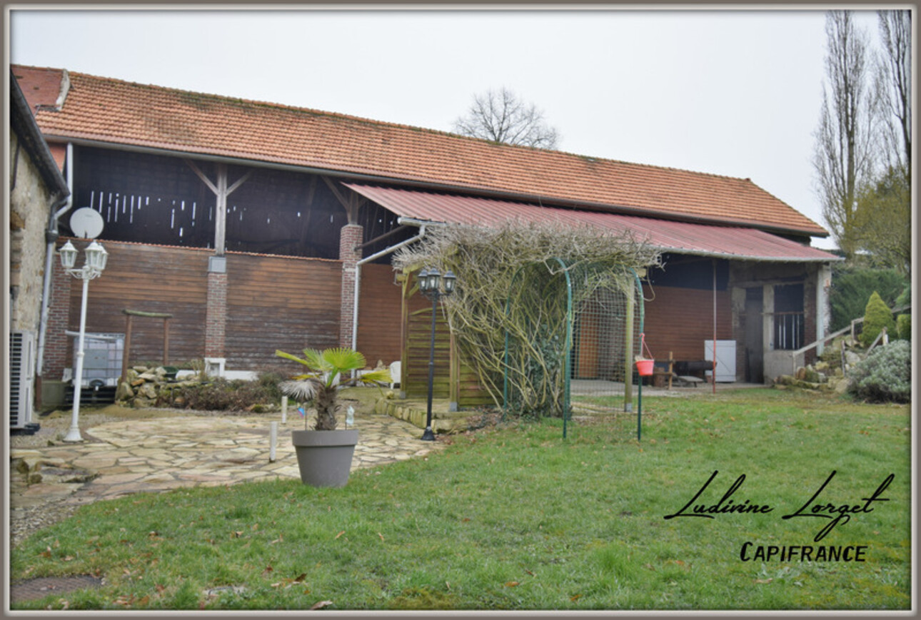 Photos 3 - Touristique - Corps de ferme (430m2hab) avec 3 logements–terrain 6473m2. Une maison principale de 168 m²-un appartement de plain-pied de 99 m²- un second appartement de 162 m²-Garage –Atelier–Dépendances– 9 boxes